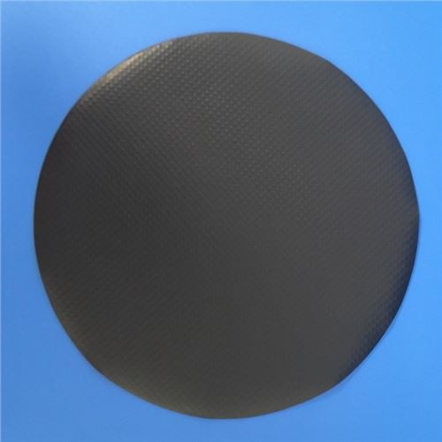 Johtava kiekkovälikappale kohokuvioitua